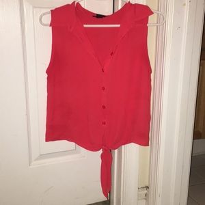 Red sleeveless blouse that ties in the front